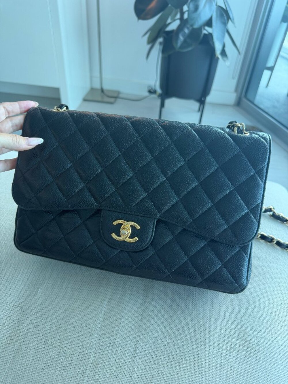 Chanel Classic Double Flap Bag - Black Caviar Leather with Gold Hardware